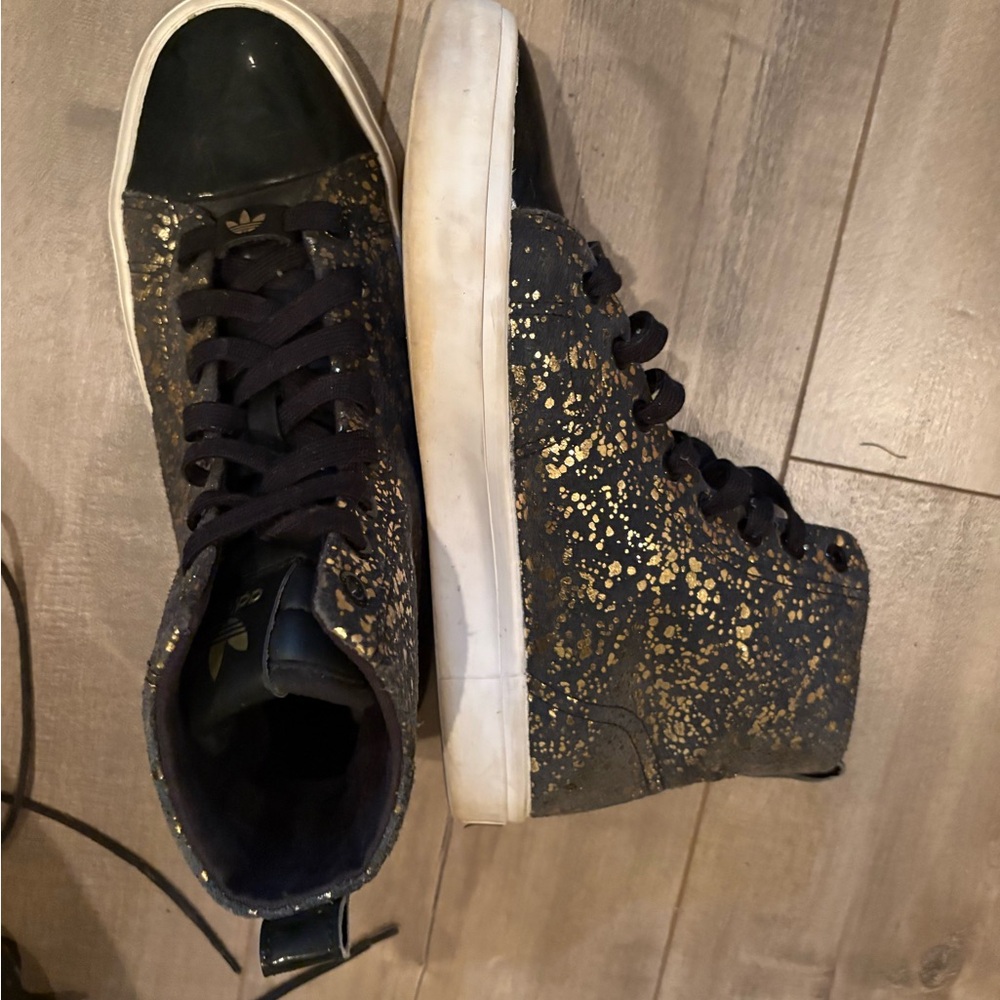 Adidas Black High-Tops with Gold Accents